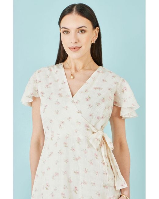 Yumi' Natural Rose Print Wrap Over Frill Dress