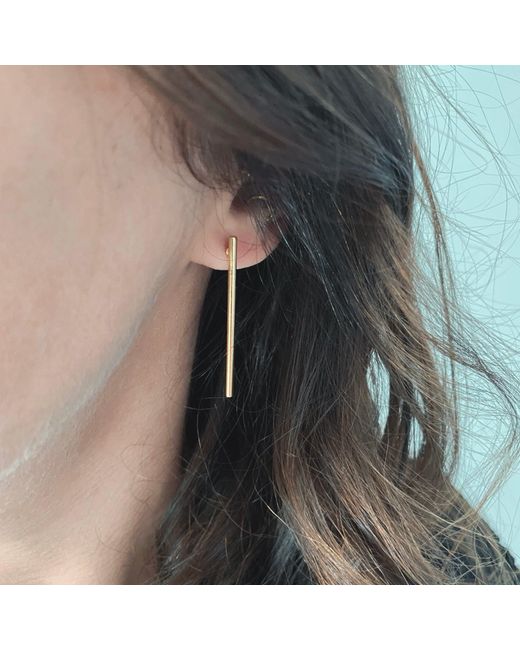 IN CAUDA VENENUM White Voltan Earrings