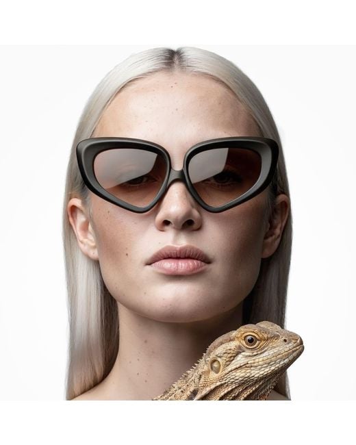 Loop and Egg Brown Sunglasses L A G Two Dark