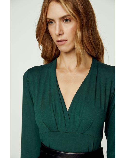 Conquista Green Long Sleeve Faux Wrap Top