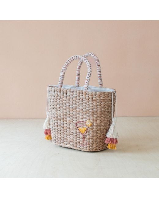 LIKHÂ Orange Neutrals Handwoven Seagrass Cocktail Tote Bag With Tassels