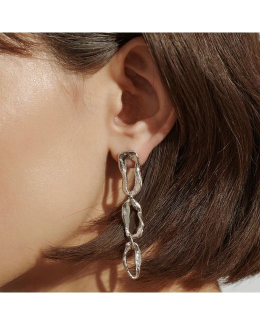 EVA REMENYI Metallic Vacation Long Chain Earrings