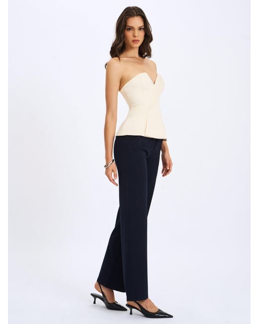 Miss Circle New York White Yani Ivory Asymmetrical Lapel Sleeveless Peplum Top