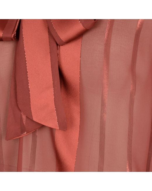 Modenaire Red Sheer Blouse With Tie Neck Detail And Bell Sleeves