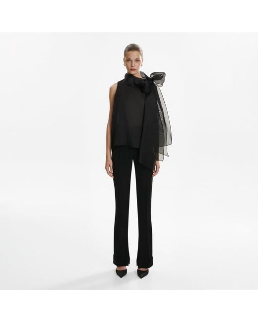 Lita Couture Black Short-Sleeve Sheer Bow Blouse