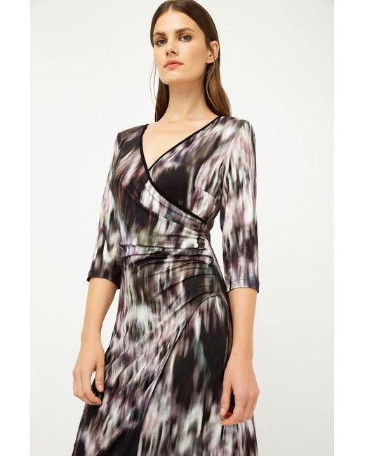 Conquista Black Print Jersey Faux Wrap Dress