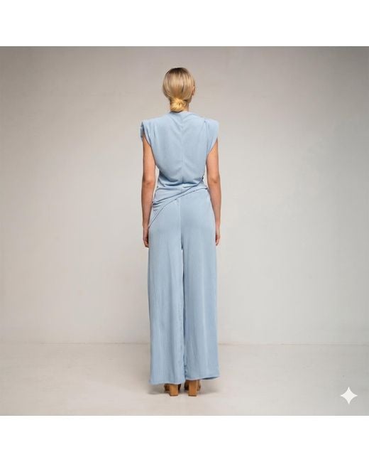 Tantra Spain Sl Blue Set Of Straight Trousers And Side Pockets. Short Sleeve Top With Asymmetrical Length