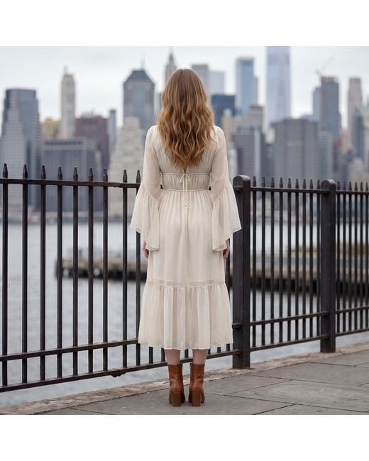 Modenaire White Vacation Style Ruffle Sleeve Maxi Dress With Plunging Neck & Tie Waist