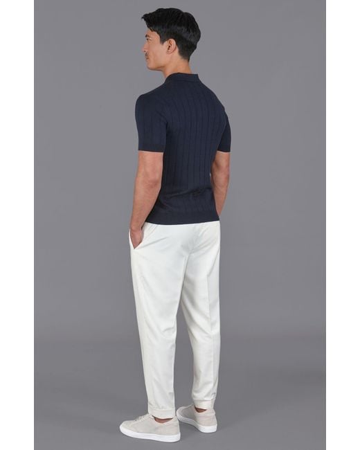 Paul James Knitwear Blue Ultra Fine Cotton Riley Selection Knit Buttonless Polo Shirt for men