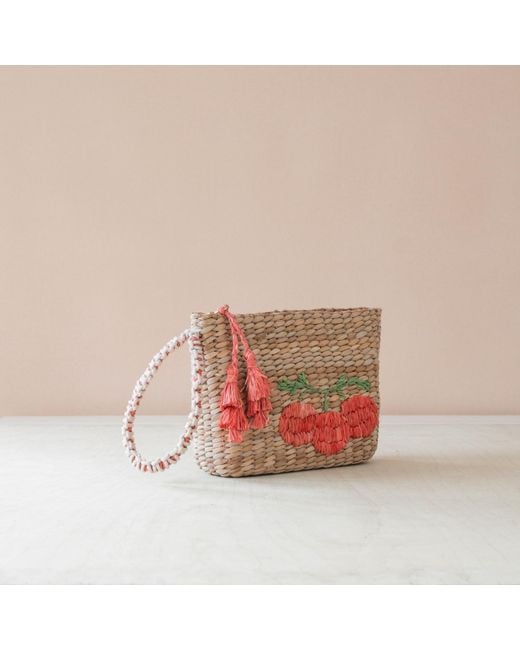 LIKHÂ Red Neutrals Handwoven Seagrass Tomato Wristlet Pouch With Tassels