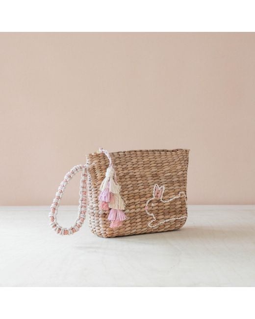 LIKHÂ Brown Neutrals Handwoven Seagrass Bunny Wristlet Pouch With Tassels