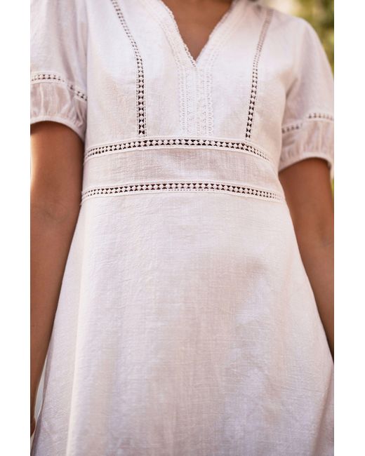 Yumi' White Lace Trim V Neck Dress