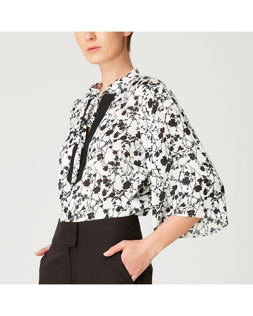 Smart and Joy Black Tulip Sleeves Blouse With Monochrome Floral Print