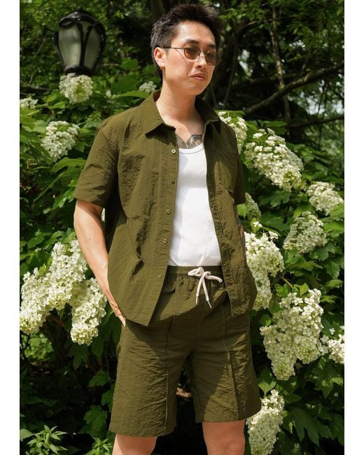 Éclectique Green Designer Casual Shorts for men