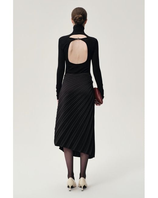 FRONT ROW SHOP Blue Open-Back Wool Jersey Top