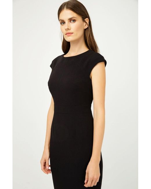 Conquista Black Solid Colour Dress With Cap Sleeves Color