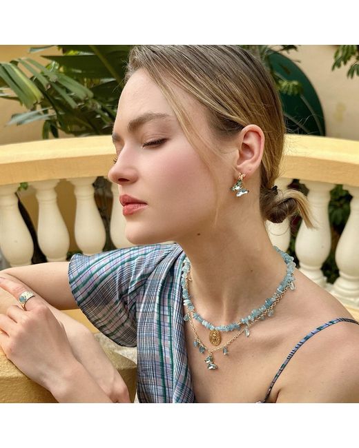 Farra Metallic Aquamarine Charms With A Butterfly Pendant Necklace