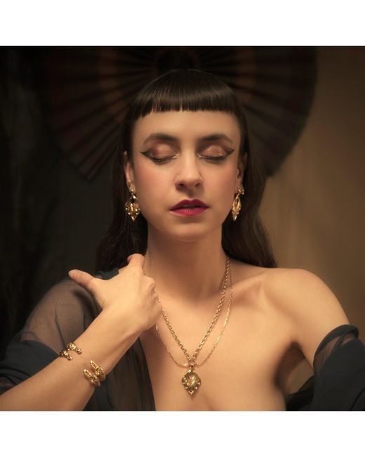 IN CAUDA VENENUM Metallic Sirius Earrings