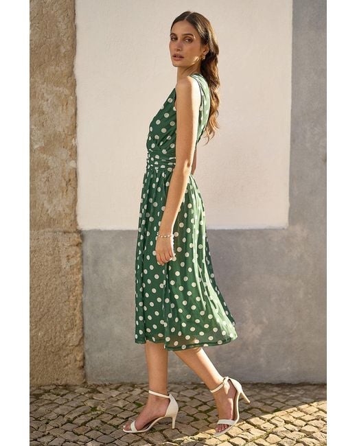 Yumi' Green Polka Dot Mesh Wrap Skater Dress With Pockets