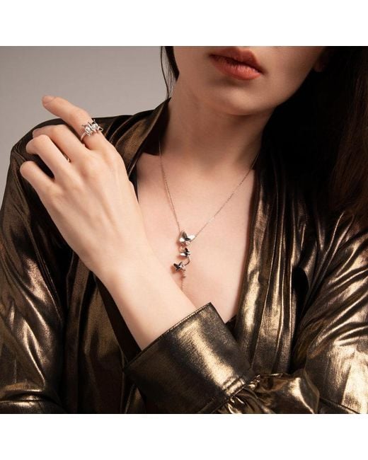 Far East Jewelry White Handcrafted & Crystal Butterfly Necklace