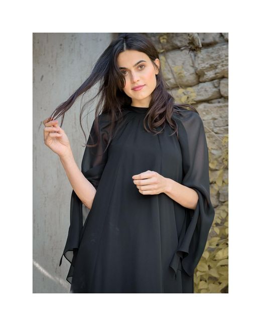 concept A trois Black Long Dress With Semi Transparent Sleeves And A Slight Train