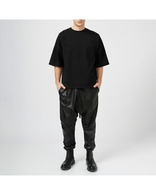 LIA ARAM Black Faux Leather Baggy Trousers for men