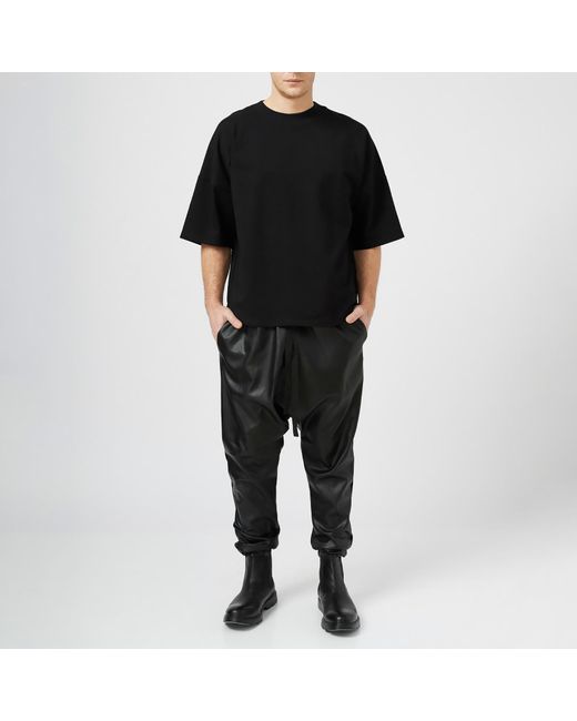 LIA ARAM Black Faux Leather Baggy Trousers for men