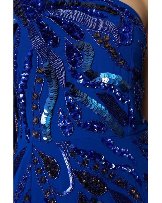 Raishma Blue Astrid A One Shoulder With A Dramatic To-The-Floor Draped Georgette Train, Falling From The Shoulder Gown