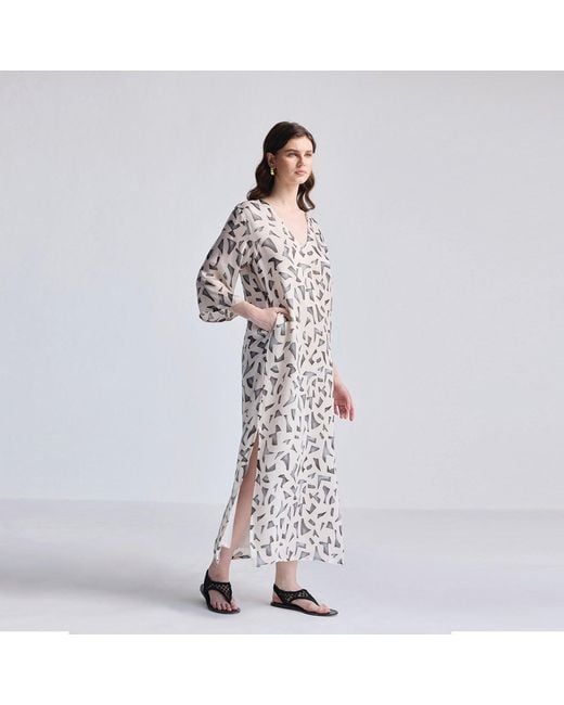 REISTOR White Maxi Dress With Side Slits