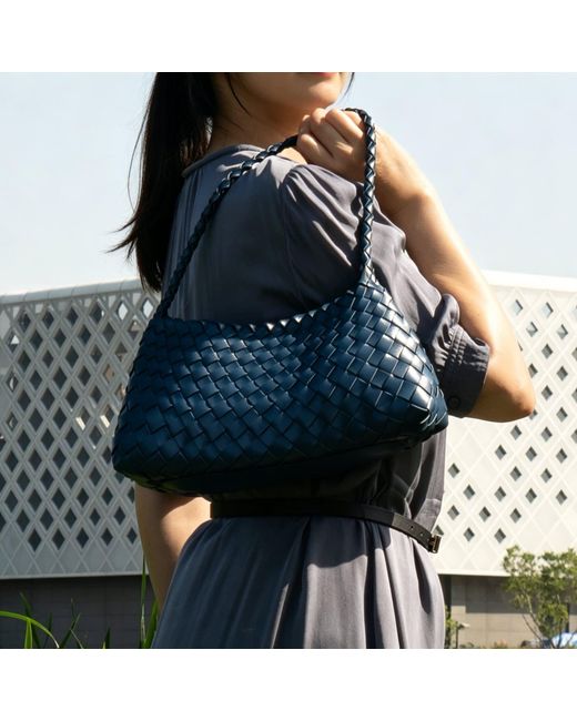 Rimini Blue Woven Vegan Leather Sling Bag 'Leontina'