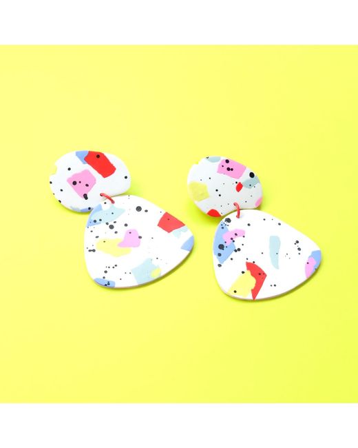 By Chavelli Yellow Paint Splatter Dangly Earrings