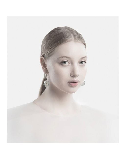 Laura Daili Metallic Neutrals Icicle Clear Blown Glass Earrings