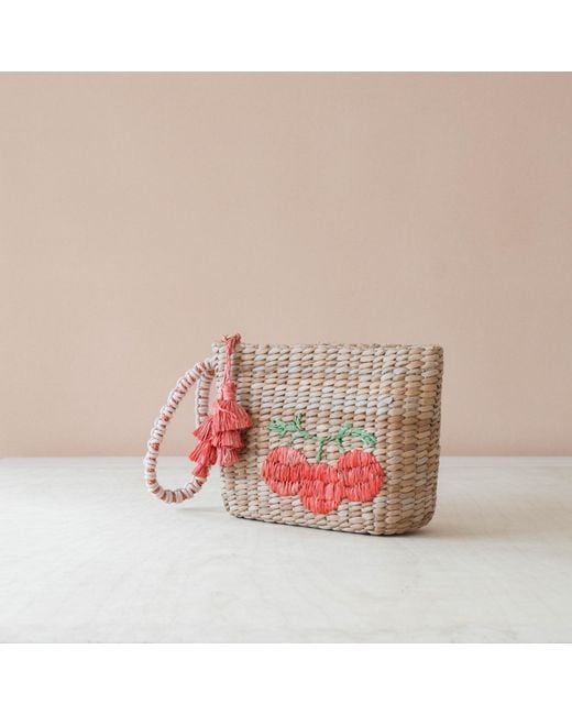 LIKHÂ Red Neutrals Handwoven Seagrass Tomato Wristlet Pouch With Tassels