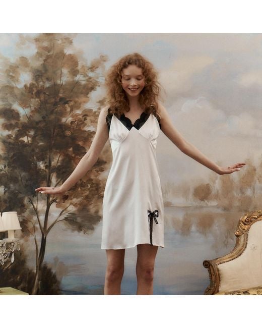 Lisa The Label White Angle Baby Bow Slip Dress