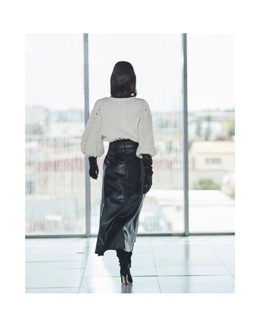 The Extreme Collection Black Jet Faux Leather Skirt Midi With Sleek Silhouette And Statement Style