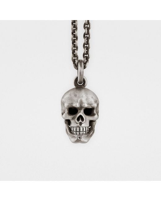 Snake Bones Metallic Skull Pendant With Hinged Jaw & Diamond Eyes for men