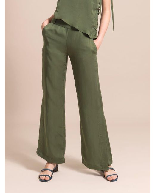 blonde gone rogue Green Flared Cupro Trousers, Cupro