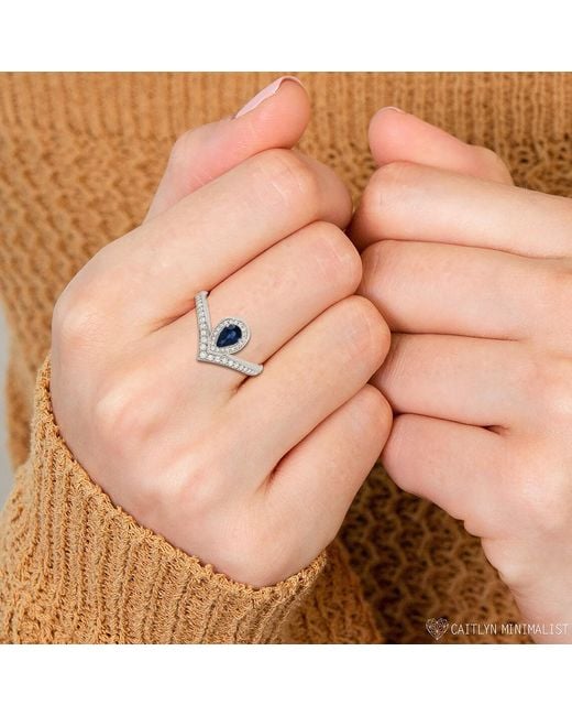 Artisan Metallic Pear Cut Sapphire Diamond V Ring