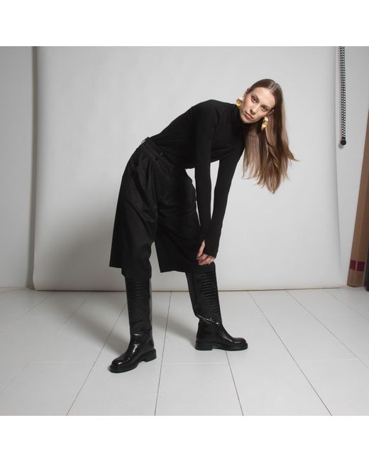 Una Berzina Black Turtleneck