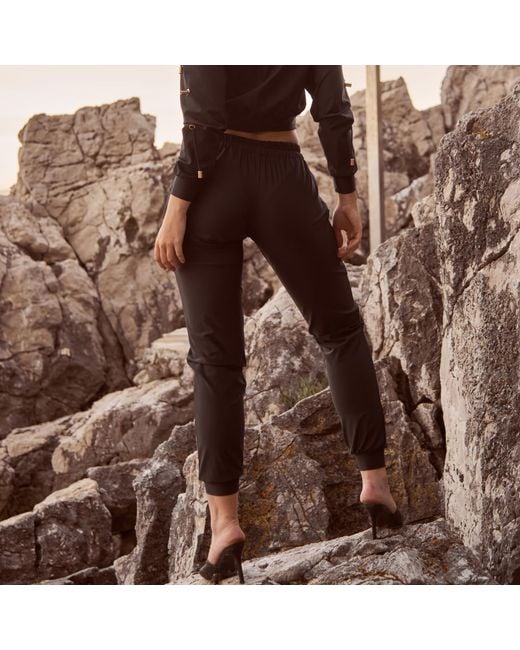 ANTONINIAS Blue Elegant Sweat Pants With Golden Details