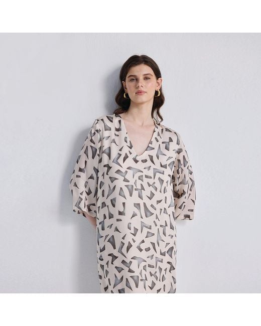 REISTOR White Maxi Dress With Side Slits