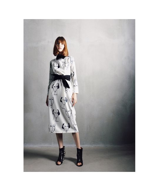 Julia Allert Natural White Designer Fitted Dress With Faces Print