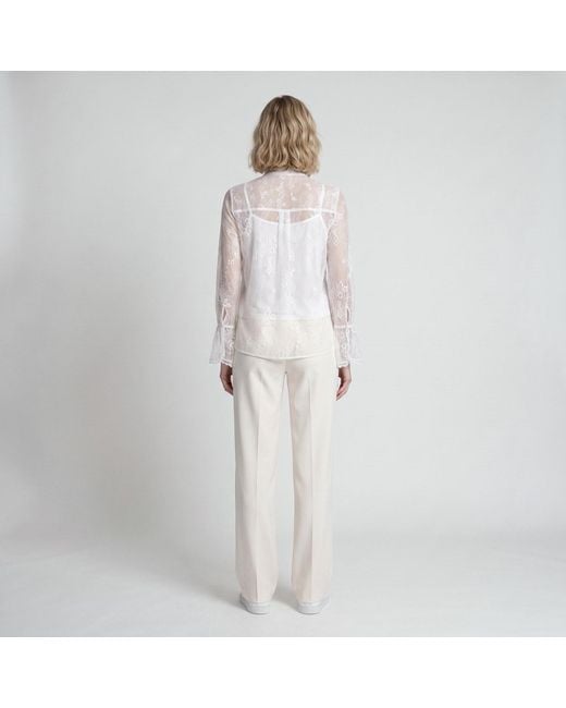 Modenaire White Sheer Lace Blouse With Bow Tie Neck Ruffle Front Detail With Cami