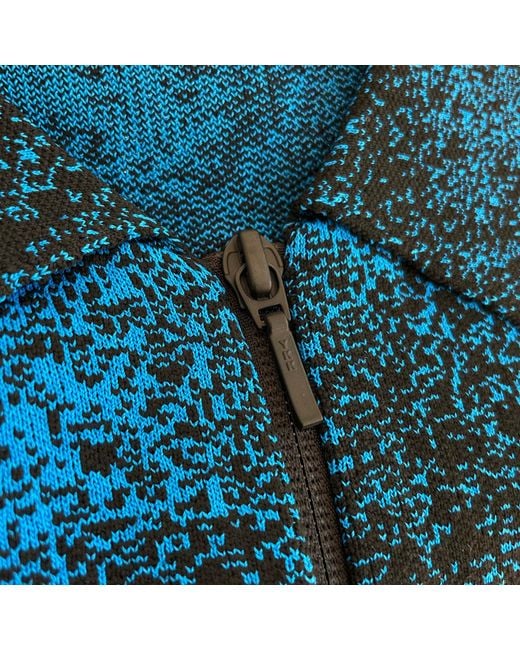 Arto. Blue Knitted Ruffles Flared Polo Top Jacket