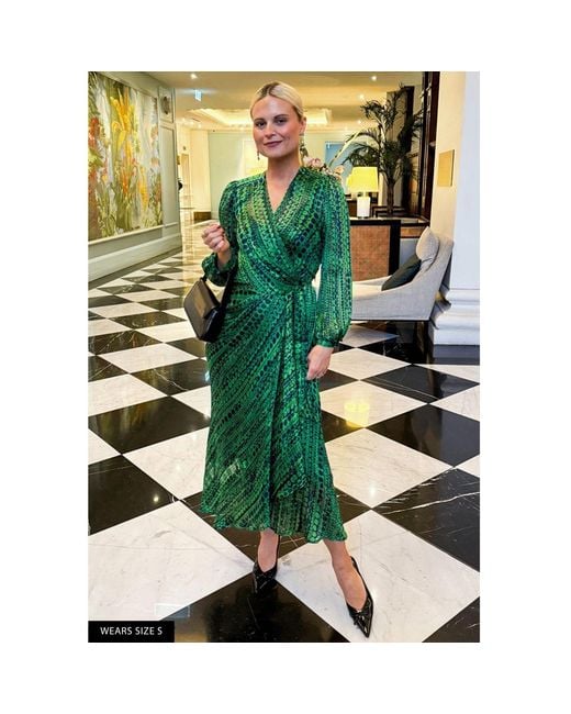 sacha drake green dress The iconic wrap design you love. Now here in an SACHA DRAKE Exclusive  Emerald Botanical Print. Make the Orchid Wrap Dress yours. #sachadrake