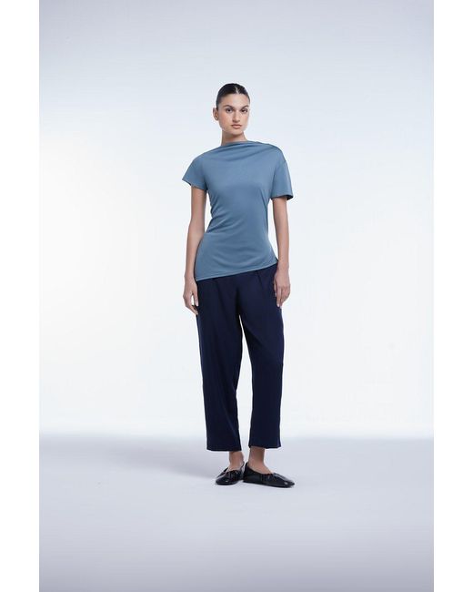 Dāl the Label Purple Asymmetrical Short Sleeve Top Raisin