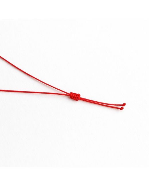 The Pheia Metallic String Fish Necklace