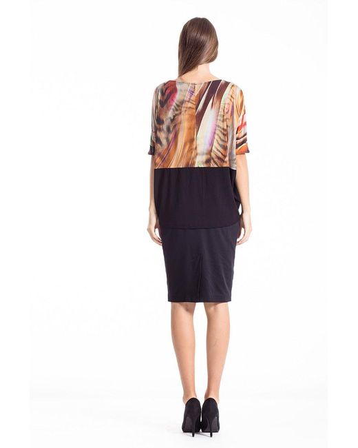 Conquista Orange Abstract Animal Print Top