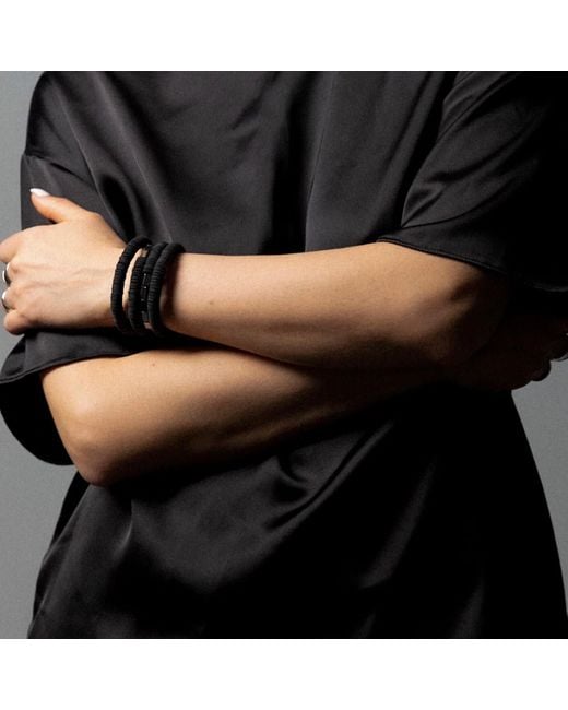 WAIWAI Black Continuous Coil Hematite Cuff