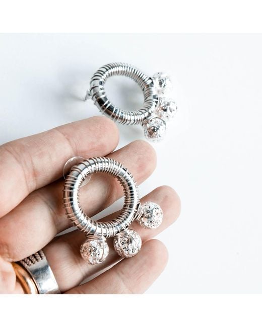 Edgar Navarro Jewelry Metallic Navarro Circular Stainless Steel Wrapped Earrings With Volcanic Stones